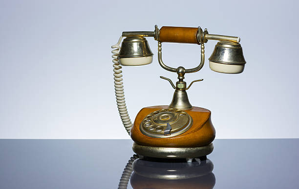 Elegant vintage phone on grey background stock photo