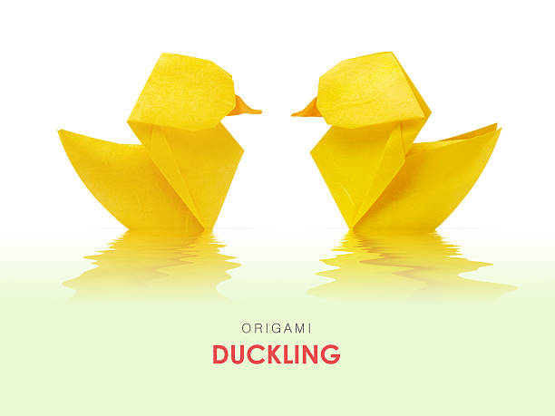 istock Origami yellow ducklings 520971906