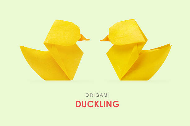 istock Origami yellow ducklings 520971978