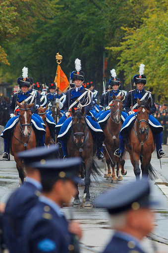 The Hague, Netherlands - September 15, 2015: mounted brigade of the Royal Netherlands Marechaussee on Lange Voorhout during Prinsjesdag, the day on which King Willem-Alexander addresses a joint session of the Dutch Senate and House of Representatives in the Knights' Hall. The Speech from the Throne sets out the main features of government policy for the coming parliamentary session.