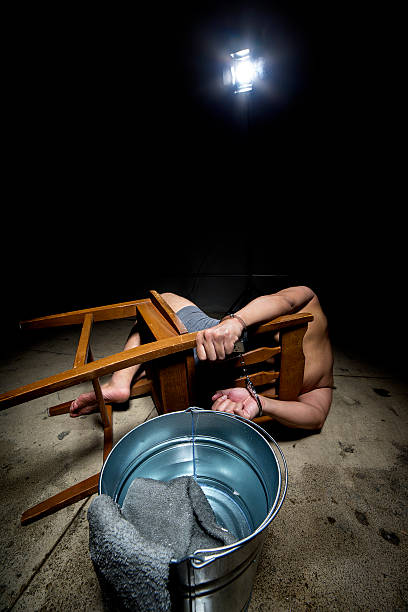 istock Prisoner Tortured with Waterboarding 520974668