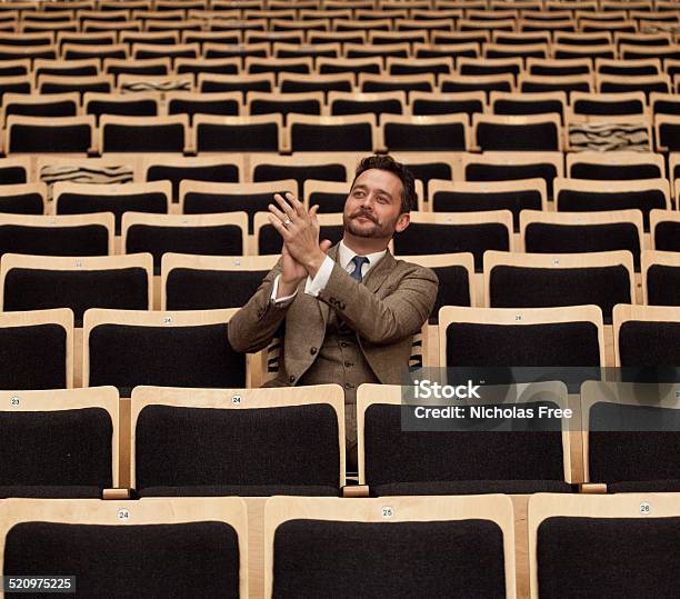 Enjoying The Whole Theatre To Ones Self Stock Photo - Download Image Now - Adult, Adults Only, Audience