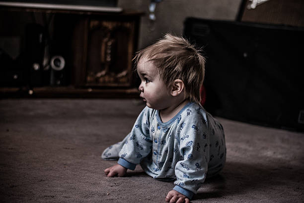 istock Moody portrait of a child playing 520975352