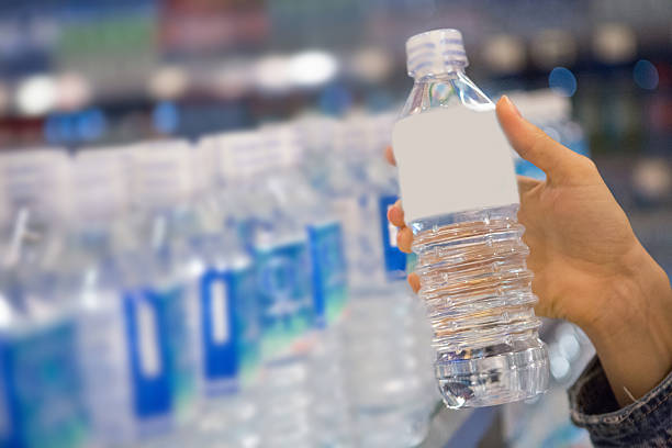 Holding bottle of water