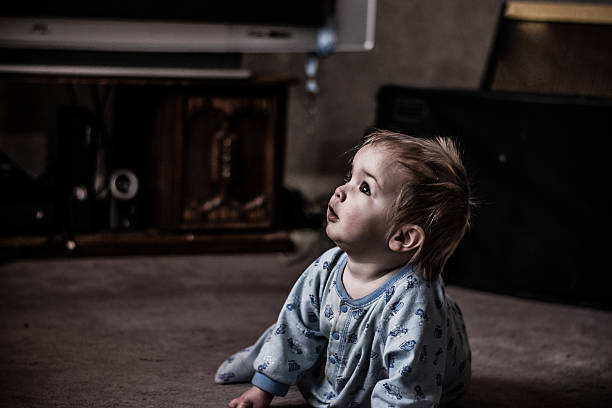 istock Moody portrait of a child playing 520975426