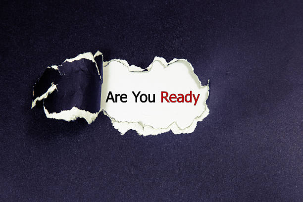 istock The question Are You Ready appearing behind black torn paper 520976216