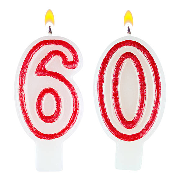 istock Birthday candles number sixty isolated on white background 520977961