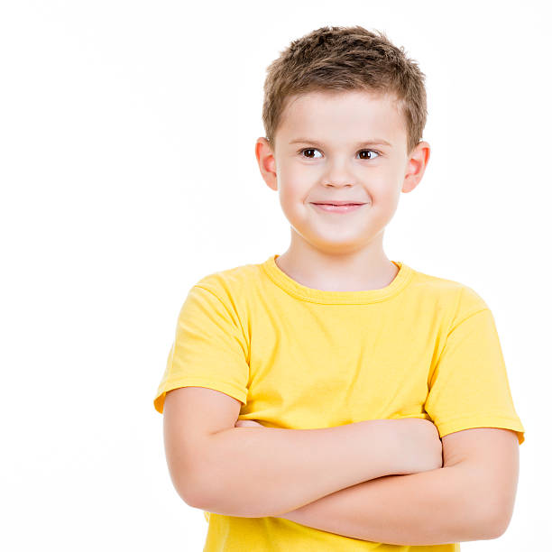 istock happy little boy over white background 520978153