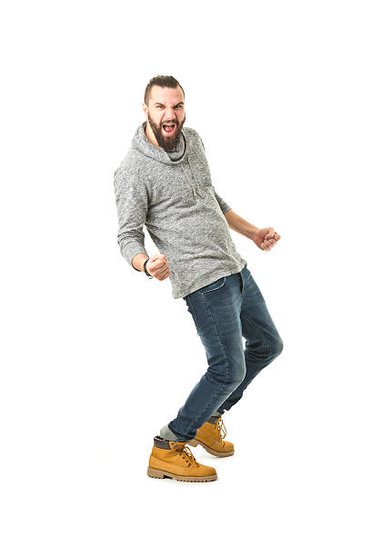 istock full length picture of young handsome man 520979006