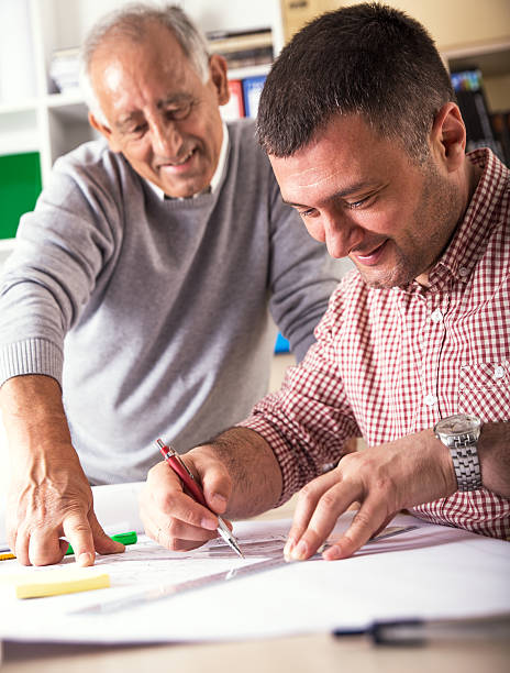 istock Architects working together on a project in the office 520979868