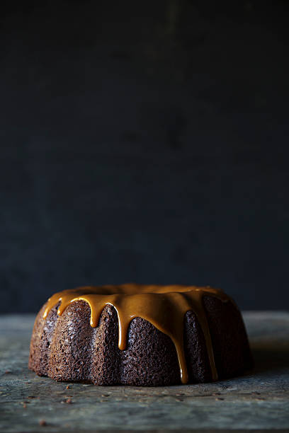 istock Chocolate cake and dripping caramel topping 520979915