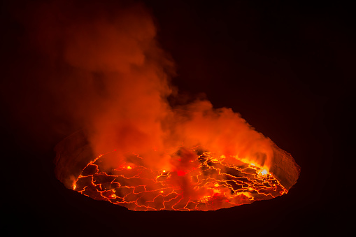 View into the lava lake inside the crater of Nyiragongo volcano – this is the largest lava lake on earth. 
