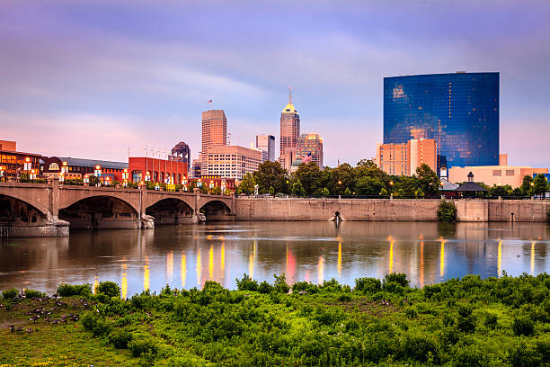 Indianapolis Beautiful view of Indianapolis skyline and the White River at sunset indianapolis photos stock pictures, royalty-free photos & images