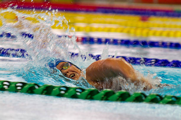 istock Swimmer racing in the swimming pool 520981980