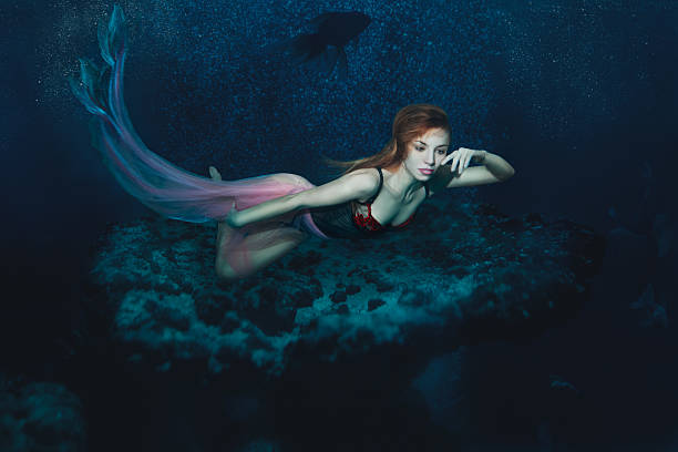 istock Mermaid Girl under the sea. 520981984