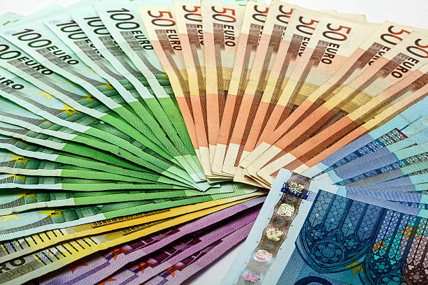 Colorful money fan of several euro notes stock photo