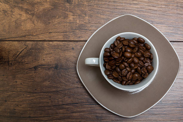 istock Cup of strong coffee on a wooden table 520985314