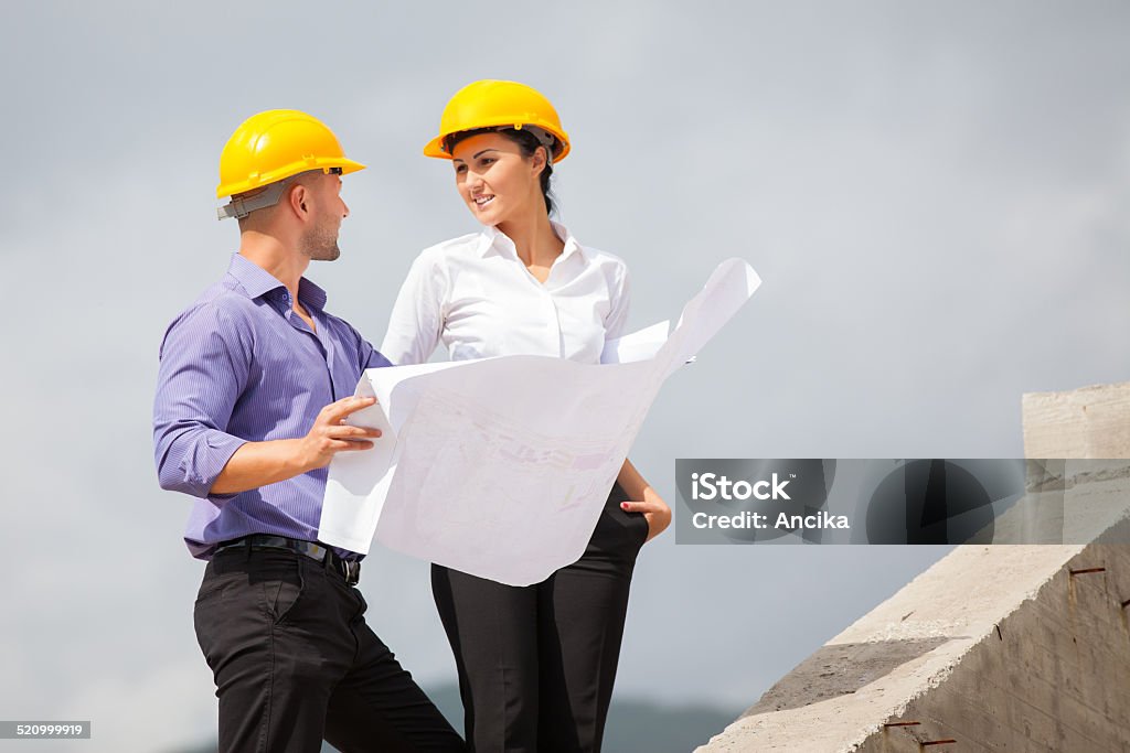 Construction manager  architect Construction manager and engineer woman working on building site Adult Stock Photo