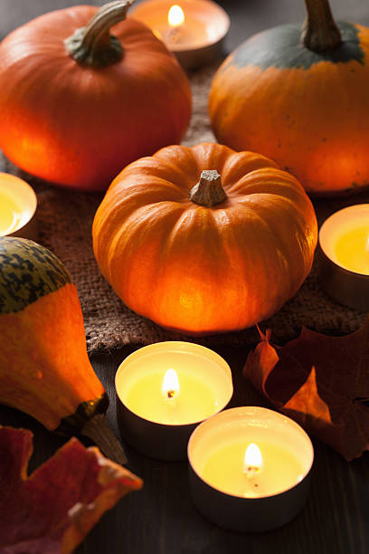 istock decorative halloween pumpkins and candles 521000505