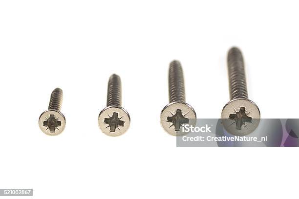 Row Of Phillips Head Screws Stock Photo - Download Image Now - Bunch, Business Finance and Industry, Carpenter