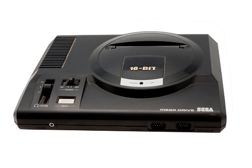 Adelaide, Australia - October 27, 2014: A studio shot of a sega mega drive game console. A 16-bit video game console developed by Sega. Sold during the Late eighties and early ninties.