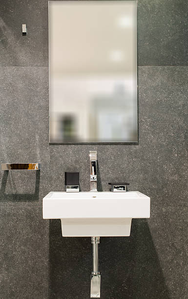 istock Washbasin and mirror in bathroom interior 521004078