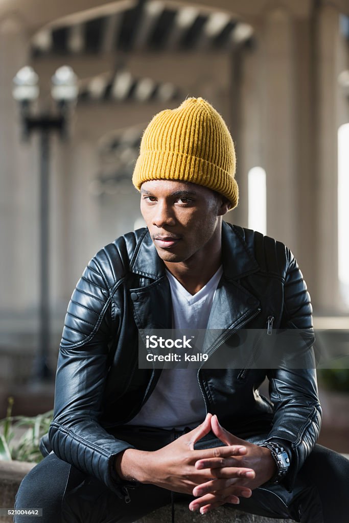Serious Black Man Wearing Yellow Beanie Leather Jacket Stock Photo -  Download Image Now - iStock