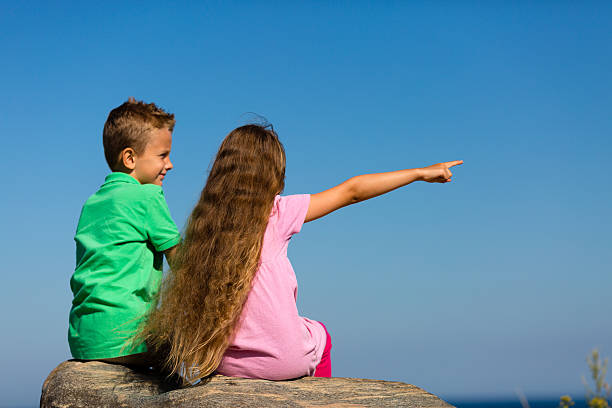 istock Boy and girl during summer time 521005167