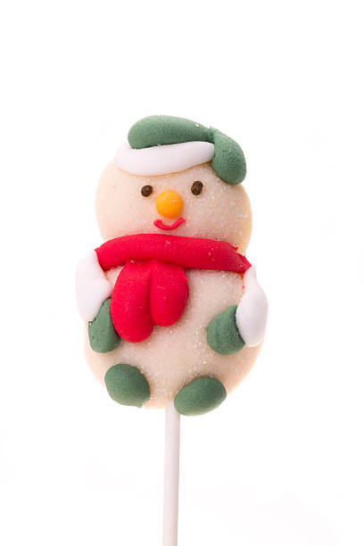 istock Christmas candy snowman lolly 521005279