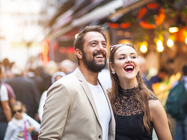 istock Young elegant couple on the street 521005713