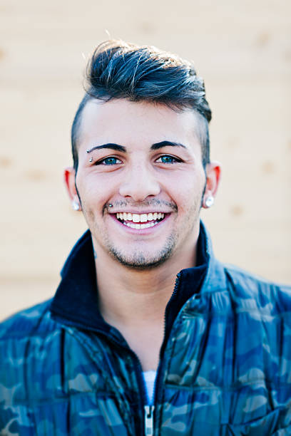 istock Portrait of young cool happy man 521006237