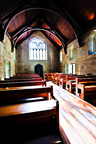 istock Old architecture church with wooden floor and benches 521009588