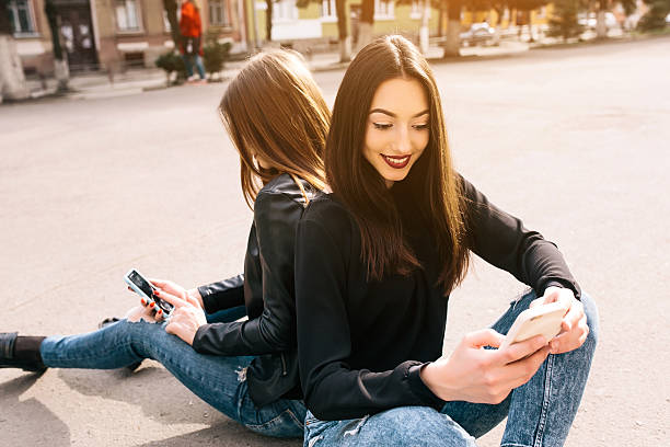 istock Two young adult girls 521011824