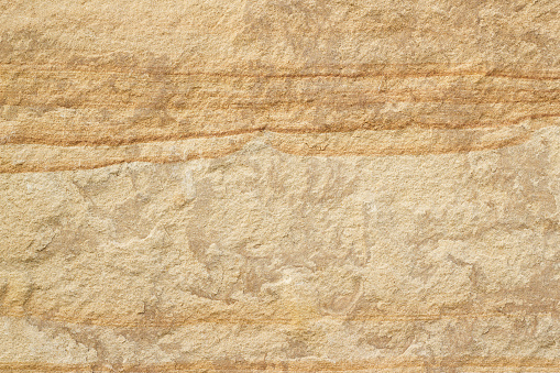 Textura de piedra fondo de arena marrón photo