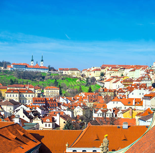 istock Orange roofs of Old Prague and Strahov Monastery 521015926