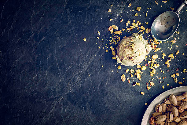 istock Delicious Pistachio Ice Cream on a Background 521016256