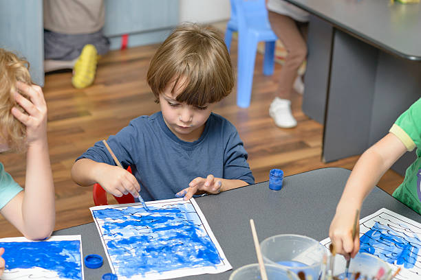 istock Kid Painting at Kindergarten 521022641