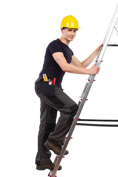 istock Mechanic climbing a ladder. 521022811