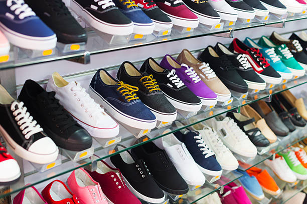 istock Shelves with casual shoes 521025063