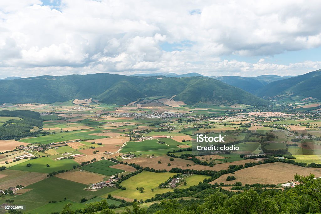 Forca Canapine (Umbria) View on the plain of Norcia from the road to Forca Canapine (Perugia, Umbria, Italy), in the park of Monti Sibillini, at summer Agricultural Field Stock Photo