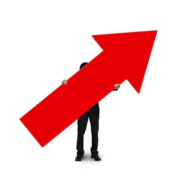 business man holding red arrow sign