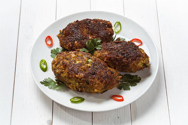 istock Fresh fish cakes on a wooden table 521028825