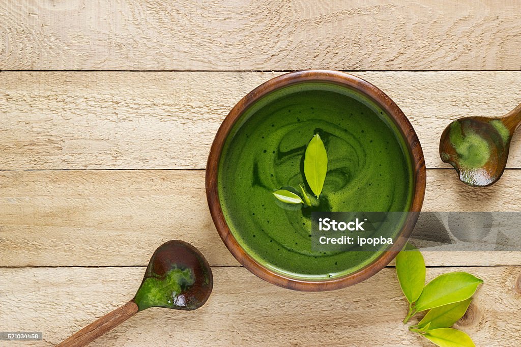 homemade green tea, refreshing for health on wooden background Green Tea Stock Photo