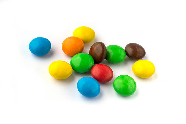 colorful round candies on a white background