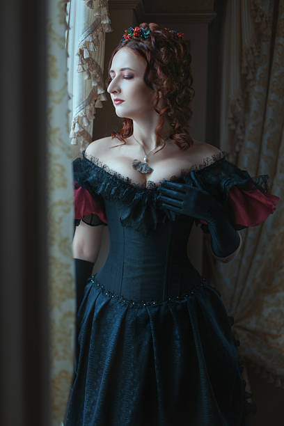 istock Graceful woman at the window. 521037086