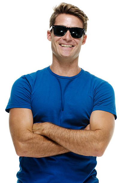 istock Smiling casual man standing with arms crossed 521038102