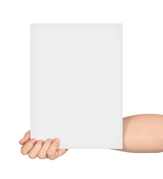 istock hand holds empty sheet of paper 521039266