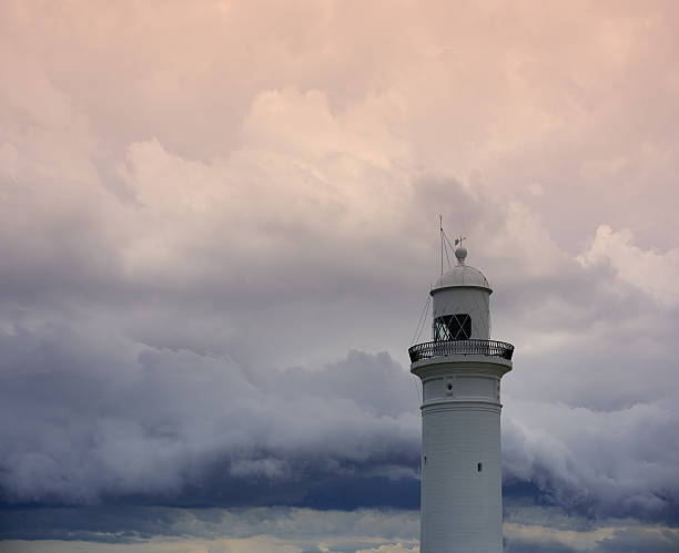 istock Lighthouse and bad weather in background 521039542