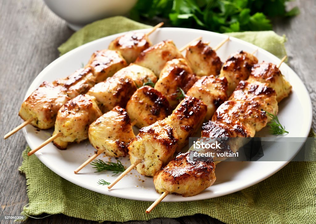 Grilled chicken on bamboo skewers Grilled chicken on bamboo skewers, close up view, shallow depth of field Chicken Meat Stock Photo