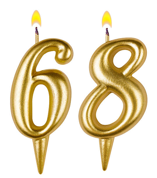 istock Birthday candles number sixty eight isolated on white background 521046563